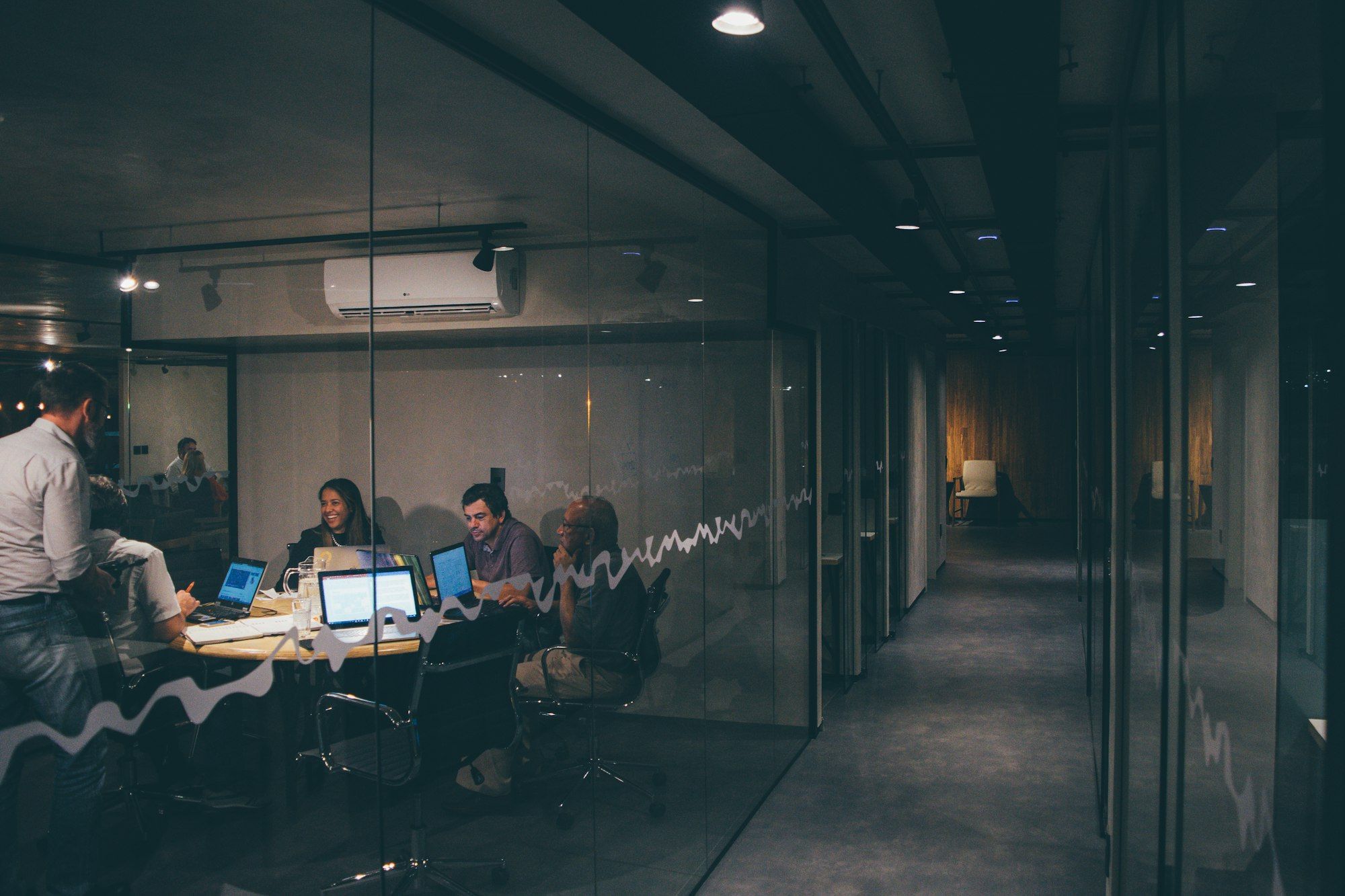 A leadership team working in a meeting room